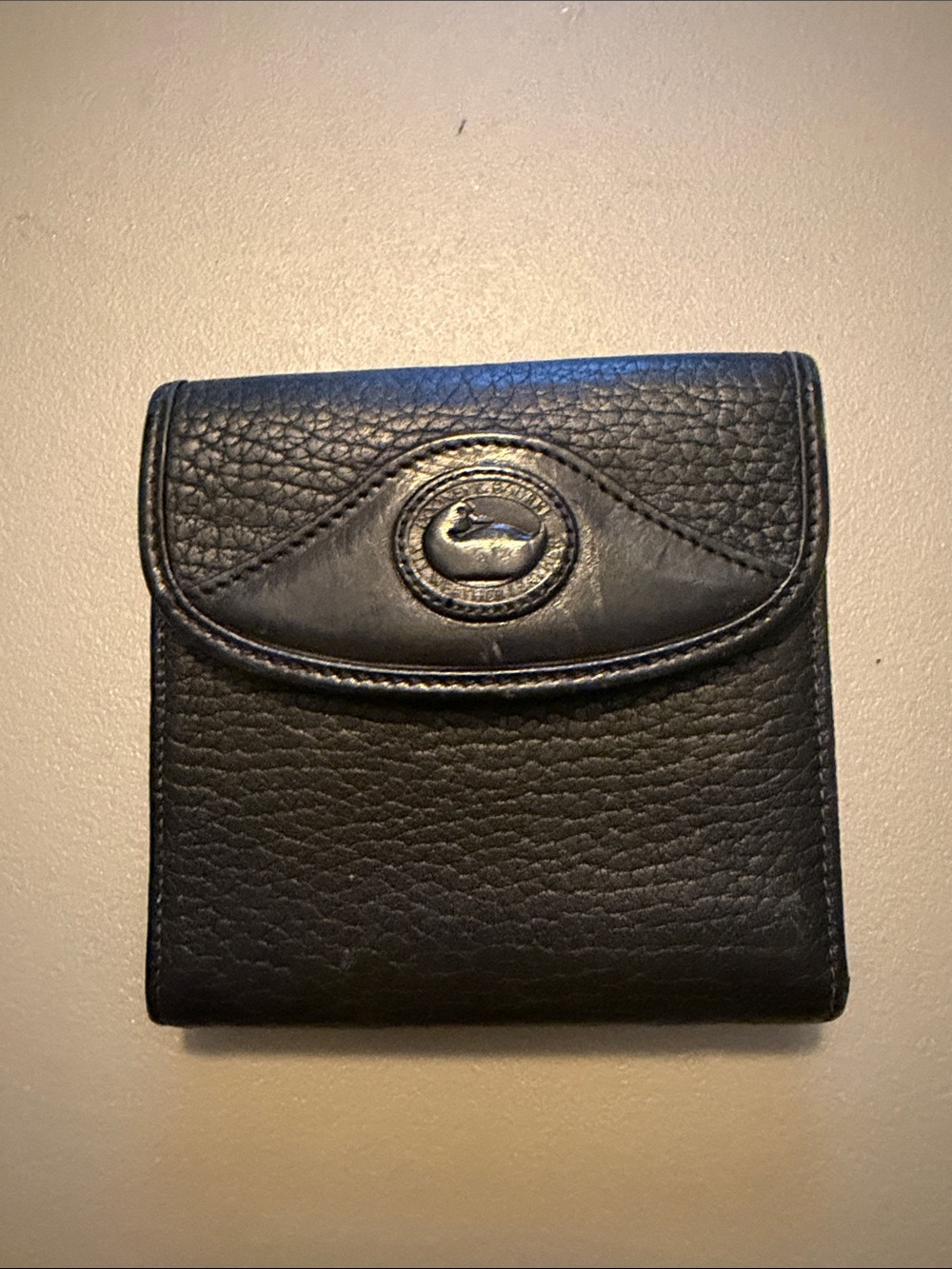 Dooney & Bourke Black Pebbled Leather Coin Wallet with Duck Emblem